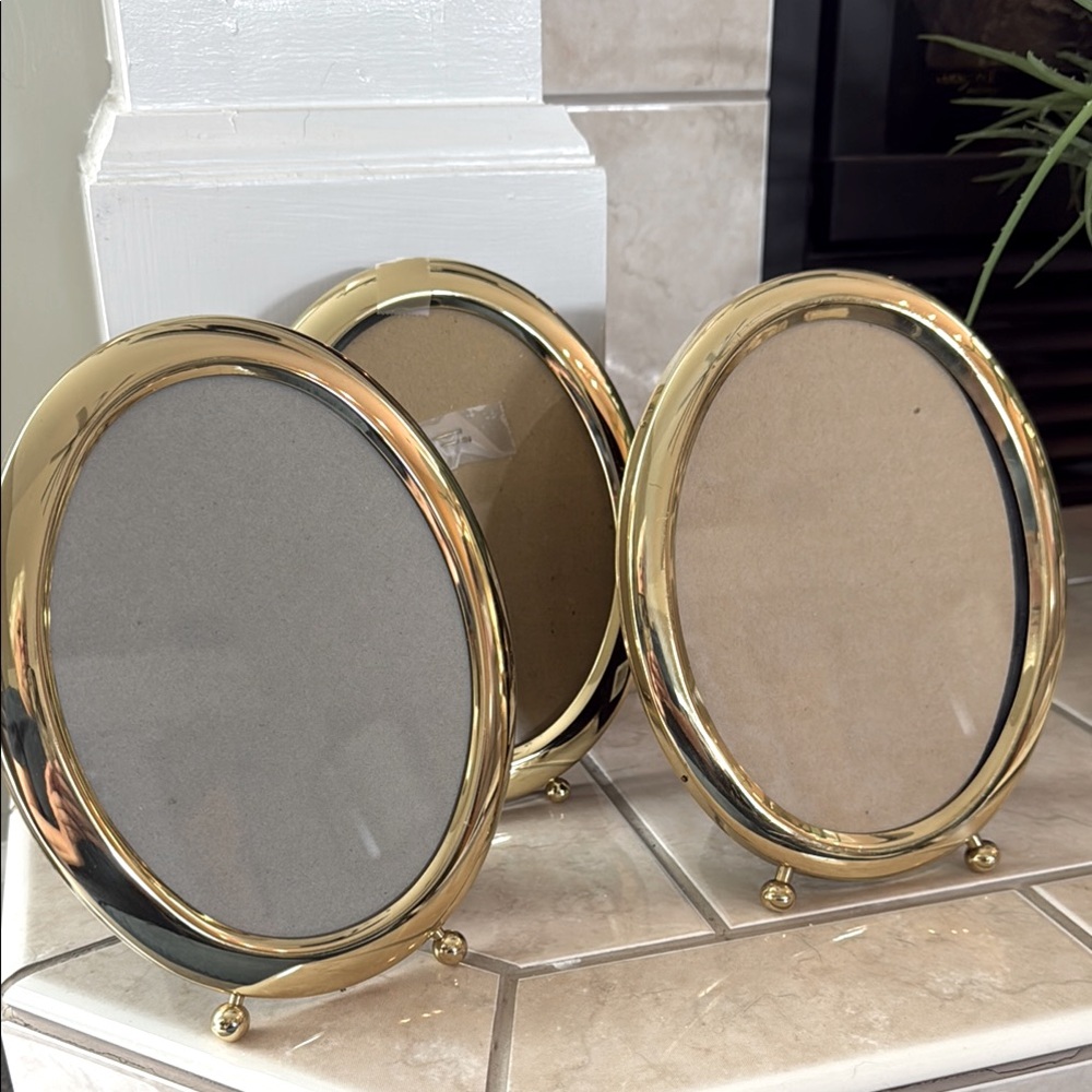 Set of Three Brass Oval Picture Frames